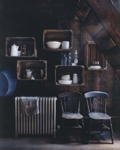 wood kitchen, chairs radiator, boxes as shelves